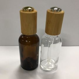 زجاجات قطارة زجاجية ، زجاجة زيت أساسي العنبر 30 مل مع زجاجة العناية بالبشرة ذات الياقة الخشبية OEM