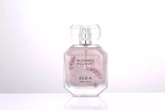 زجاجات العطور الفارغة الزجاجية الفاخرة السائبة شعار منقوش مع غطاء Surlyn