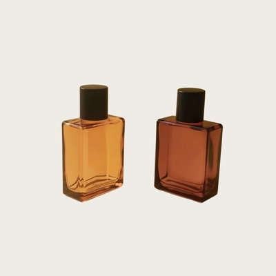 زجاجة عطر زجاجية سعة 25 مل مستطيلة مسطحة OEM ملصق خاص زجاجة تعبئة مستحضرات التجميل المصنعة